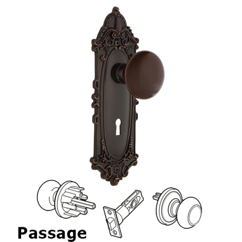 Nostalgic Warehouse Complete Passage Set with Keyhole - Victorian Plate with Brown Porcelain Door Knob in Timeless Bronze