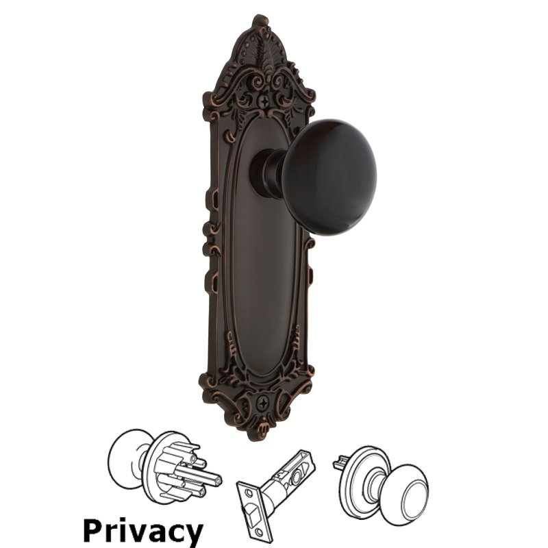 Nostalgic Warehouse Privacy Victorian Plate with Black Porcelain Door Knob in Timeless Bronze