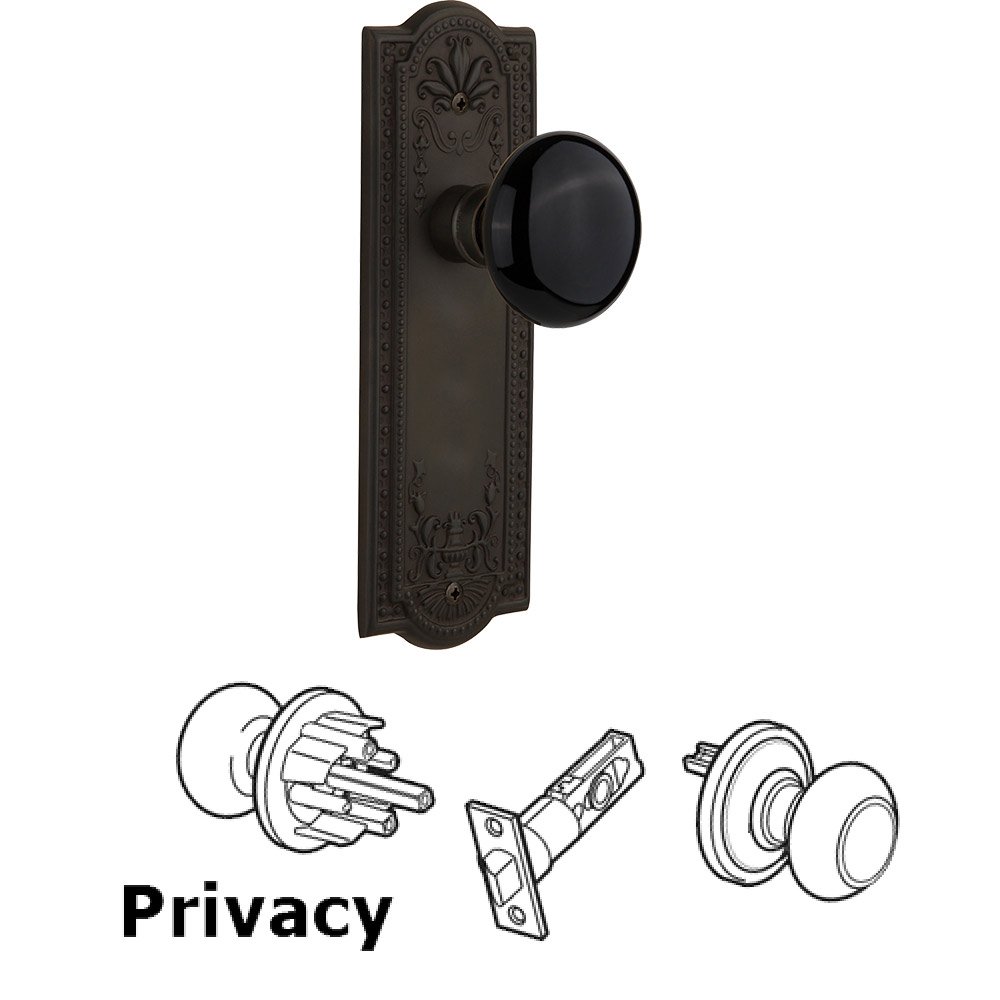 Nostalgic Warehouse Privacy Knob - Meadows Plate with Black Porcelain Knob without Keyhole in Oil Rubbed Bronze