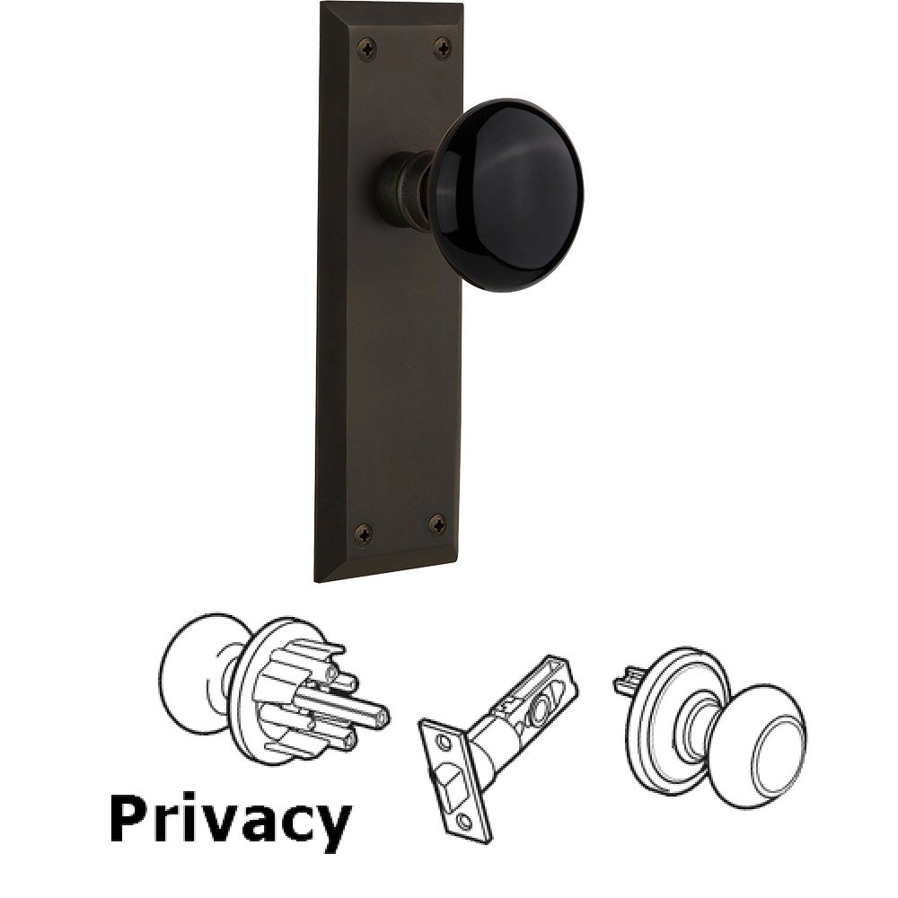 Nostalgic Warehouse Privacy Knob - New York Plate with Black Porcelain Knob without Keyhole in Oil Rubbed Bronze
