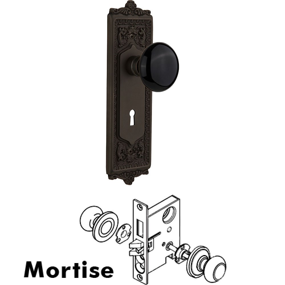 Nostalgic Warehouse Mortise - Egg and Dart Plate with Black Porcelain Knob with Keyhole in Oil Rubbed Bronze