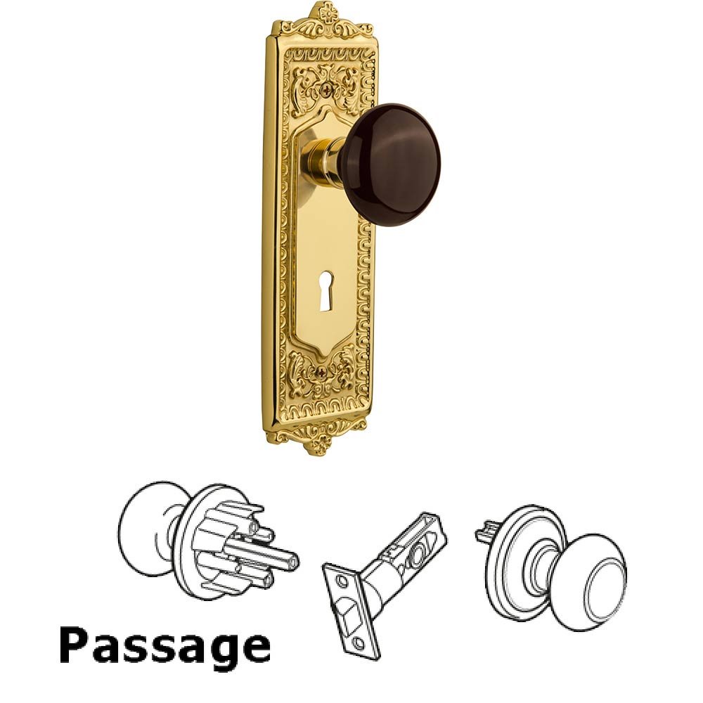 Nostalgic Warehouse Passage Knob - Egg and Dart Plate with Brown Porcelain Knob with Keyhole in Polished Brass