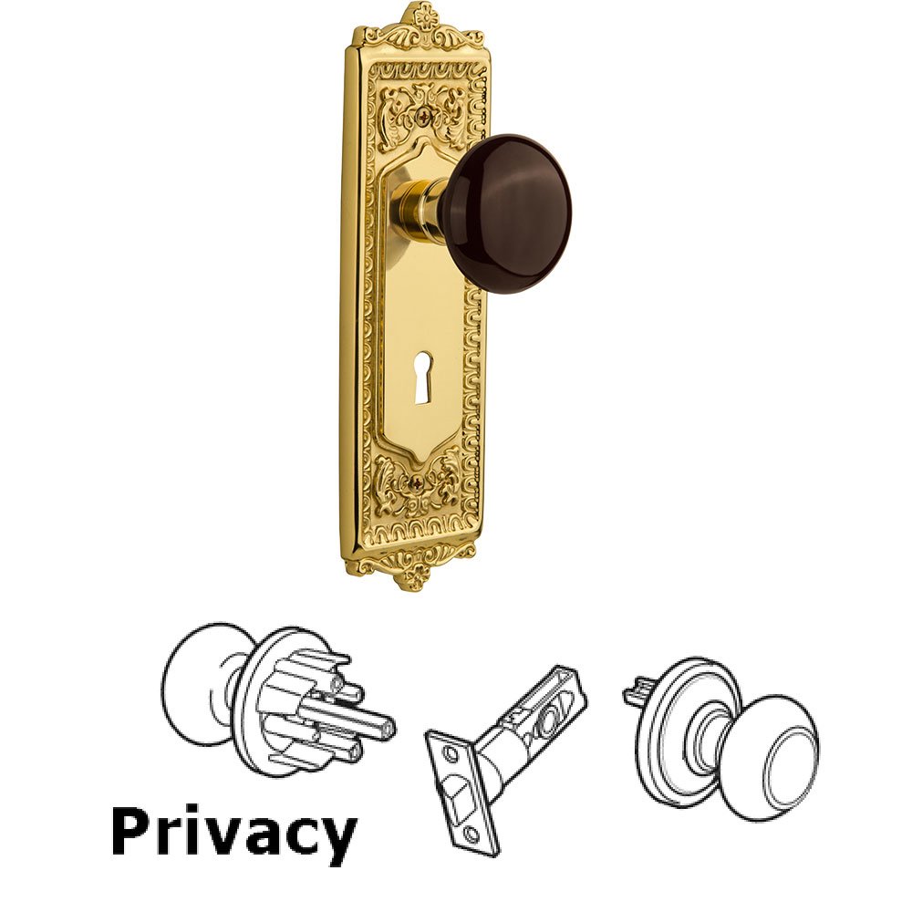 Nostalgic Warehouse Privacy Egg & Dart Plate with Keyhole and Brown Porcelain Door Knob in Polished Brass