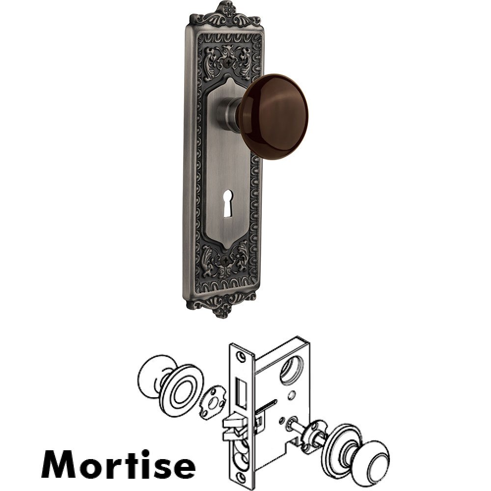 Nostalgic Warehouse Mortise - Egg and Dart Plate with Brown Porcelain Knob with Keyhole in Antique Pewter