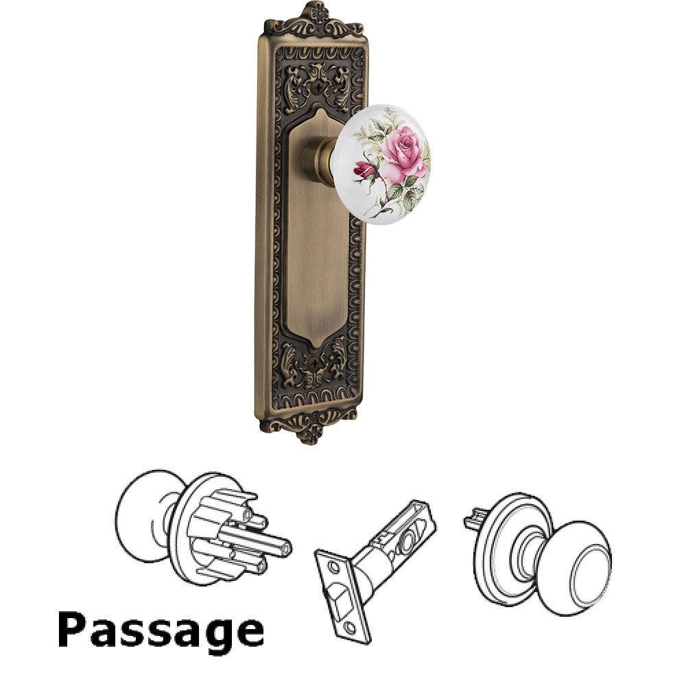 Nostalgic Warehouse Passage Knob - Egg and Dart Plate with Rose Porcelain Knob without Keyhole in Antique Brass