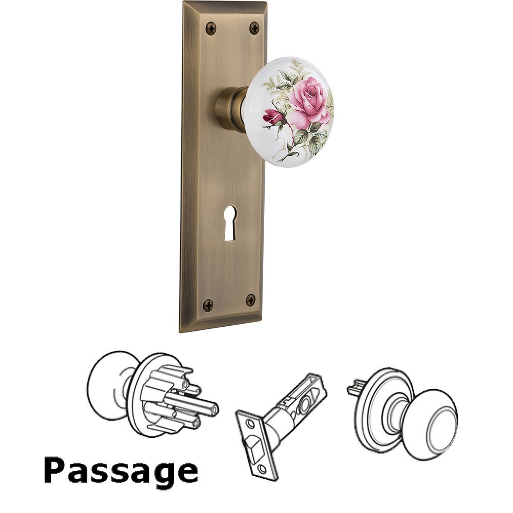 Nostalgic Warehouse Passage Knob - New York Plate with Rose Porcelain Knob with Keyhole in Antique Brass
