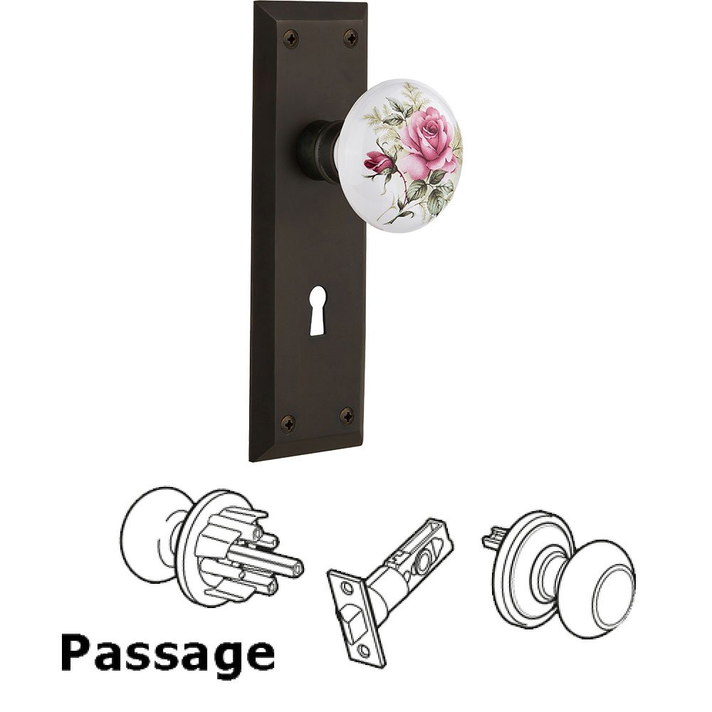 Nostalgic Warehouse Passage New York Plate with Keyhole and White Rose Porcelain Door Knob in Oil-Rubbed Bronze