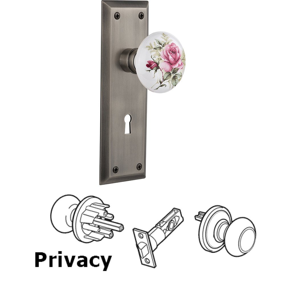 Nostalgic Warehouse Privacy New York Plate with Keyhole and White Rose Porcelain Door Knob in Antique Pewter