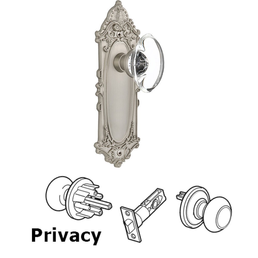 Nostalgic Warehouse Privacy Knob - Victorian Plate with Oval Clear Crystal Knob without Keyhole in Satin Nickel