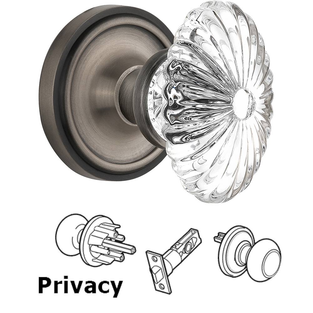 Nostalgic Warehouse Privacy Knob - Classic Rose with Oval Fluted Crystal Knob in Antique Pewter