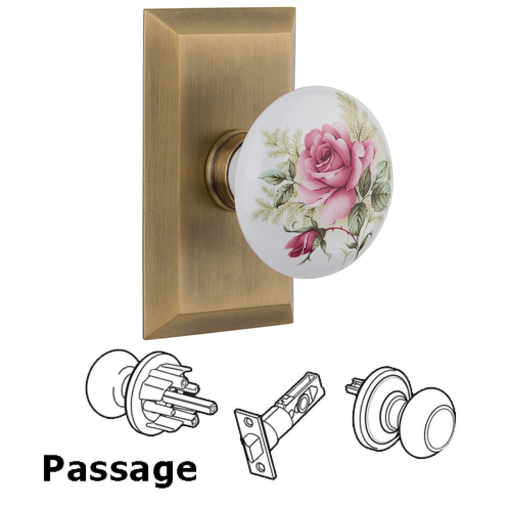 Nostalgic Warehouse Passage Studio Plate with White Rose Porcelain Knob in Antique Brass