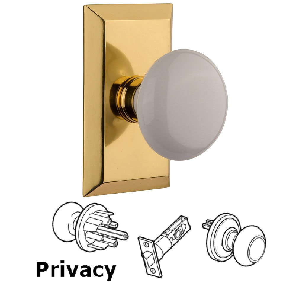 Nostalgic Warehouse Privacy Studio Plate with White Porcelain Knob in Polished Brass