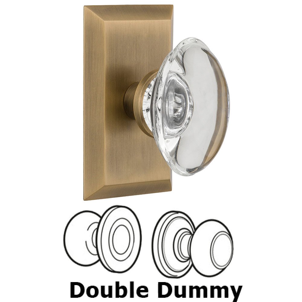 Nostalgic Warehouse Double Dummy Studio Plate with Oval Clear Crystal Knob in Antique Brass