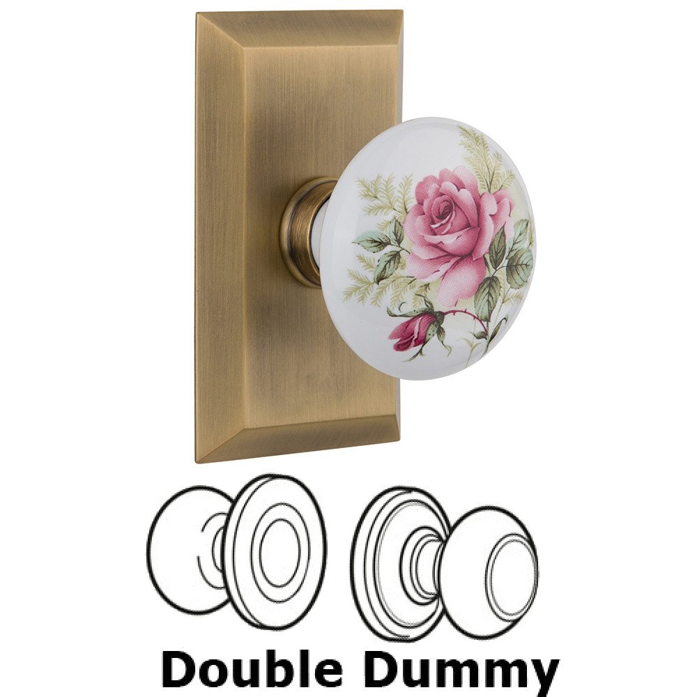 Nostalgic Warehouse Double Dummy Studio Plate with White Rose Porcelain Knob in Antique Brass