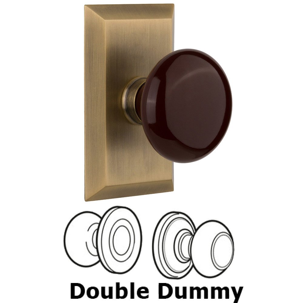 Nostalgic Warehouse Double Dummy Studio Plate with Brown Porcelain Knob in Antique Brass