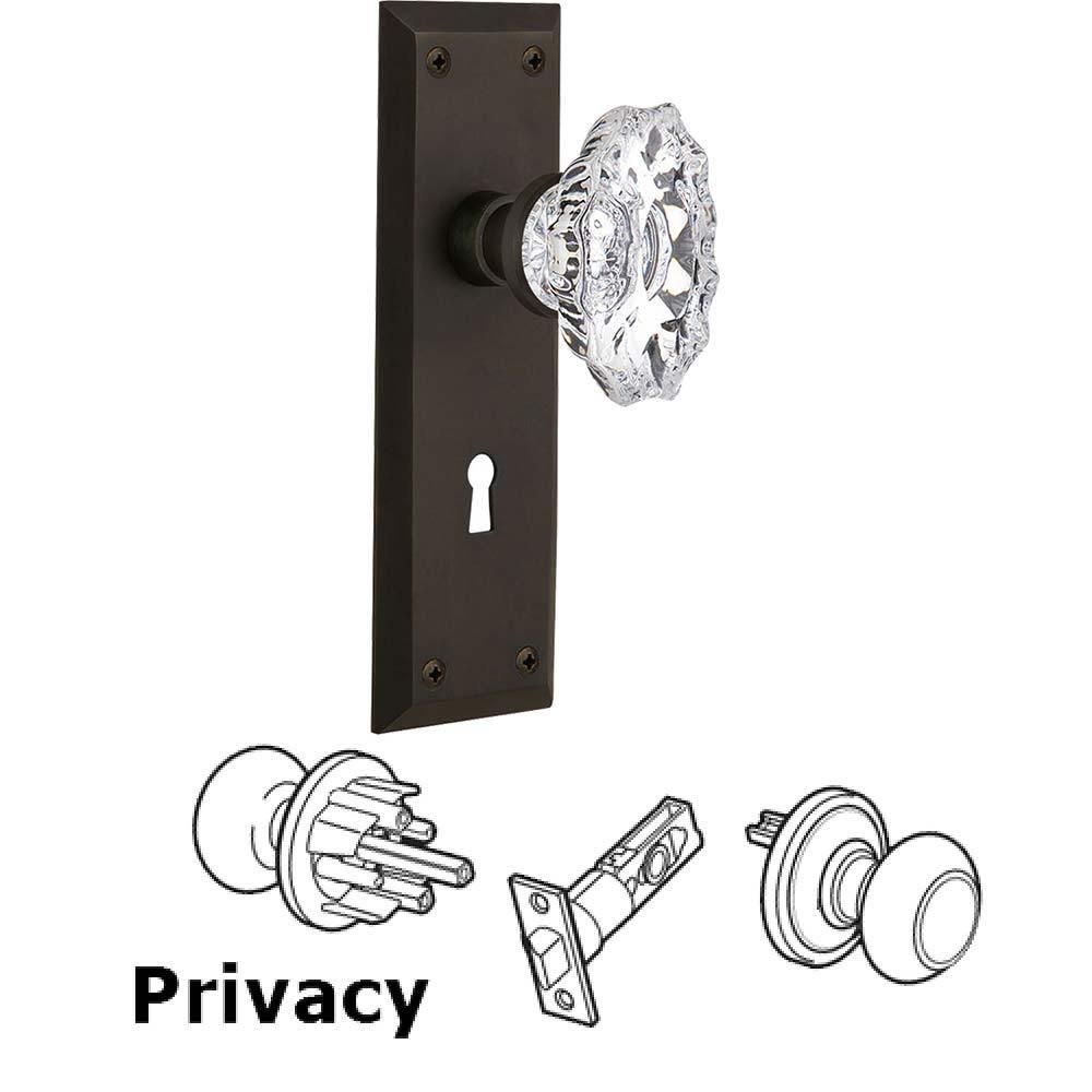 Nostalgic Warehouse Complete Privacy Set With Keyhole - New York Plate with Chateau Crystal Knob in Oil Rubbed Bronze