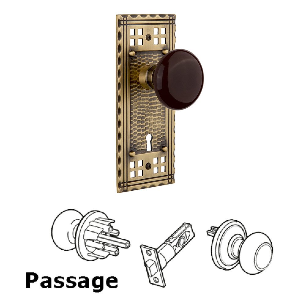 Nostalgic Warehouse Passage Craftsman Plate with Brown Porcelain Knob and Keyhole in Antique Brass
