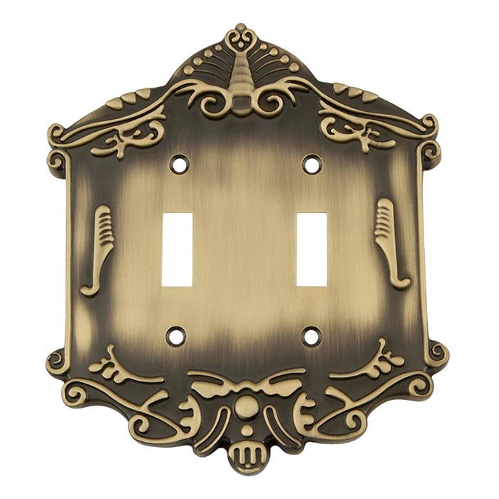 Nostalgic Warehouse Double Toggle Switchplate in Antique Brass