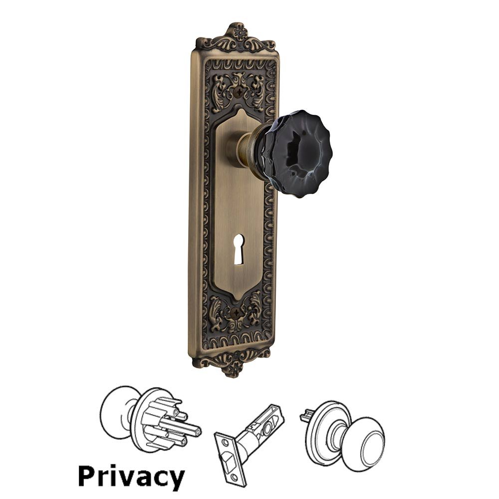 Nostalgic Warehouse Nostalgic Warehouse - Privacy - Egg & Dart Plate with Keyhole Crystal Black Glass Door Knob in Antique Brass