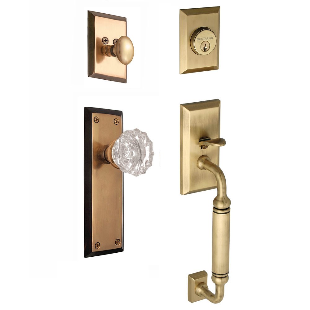 Nostalgic Warehouse Handleset - New York with "C" Grip and Crystal Knob in Antique Brass and Vintage Brass