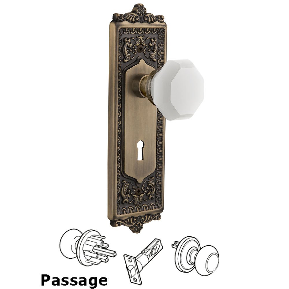 Nostalgic Warehouse Passage - Egg & Dart Plate with Keyhole with Waldorf White Milk Glass Knob in Antique Brass 