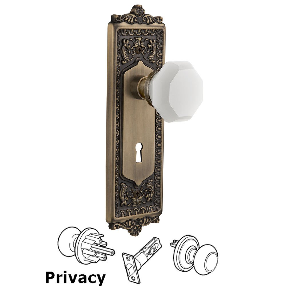 Nostalgic Warehouse Privacy - Egg & Dart Plate with Keyhole with Waldorf White Milk Glass Knob in Antique Brass