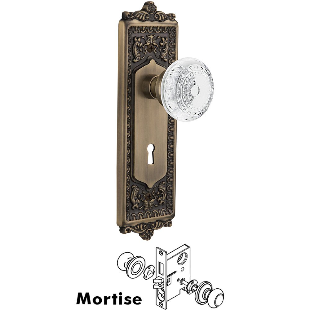 Nostalgic Warehouse Mortise - Egg & Dart Plate With Crystal Meadows Knob in Antique Brass