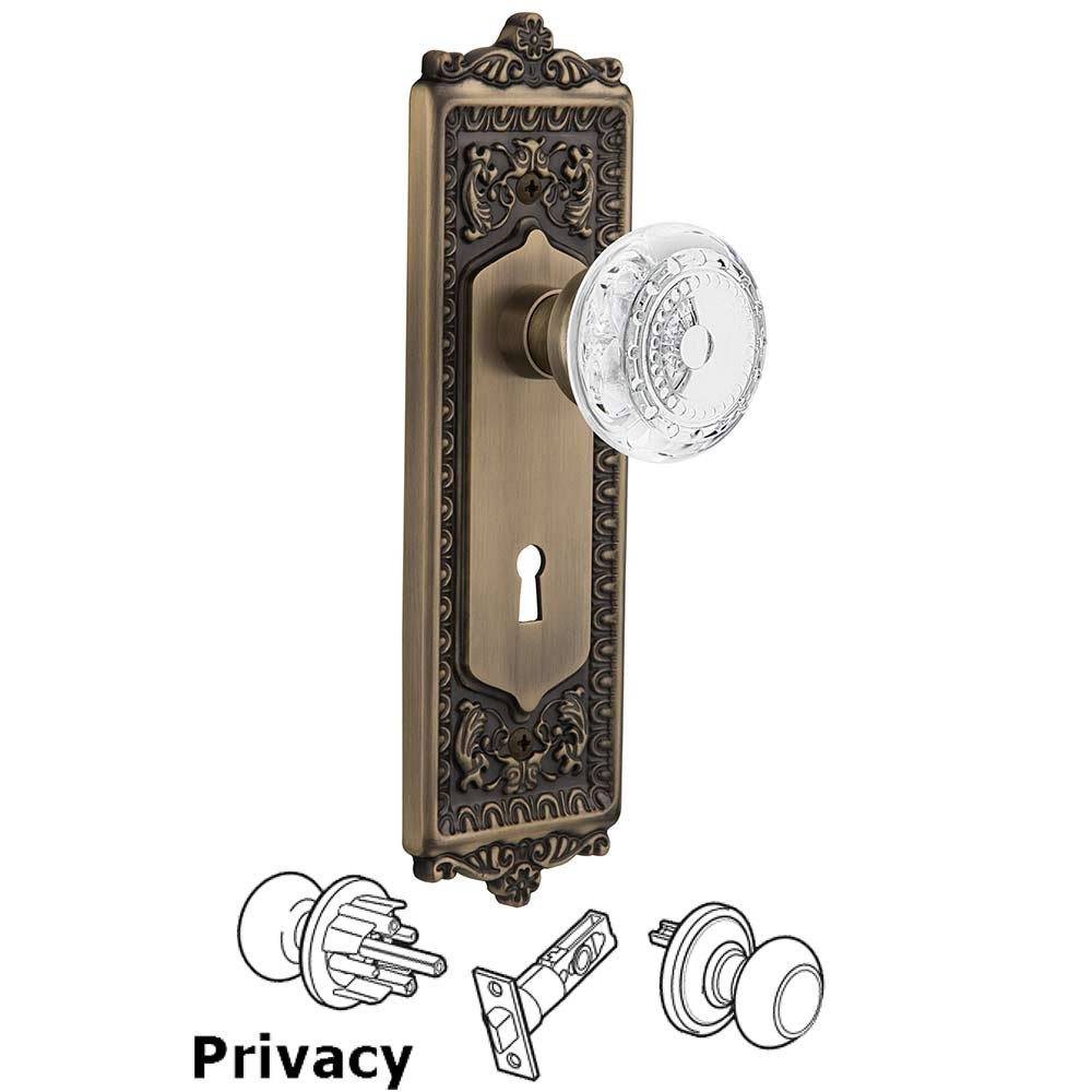 Nostalgic Warehouse Privacy - Egg & Dart Plate With Keyhole and Crystal Meadows Knob in Antique Brass
