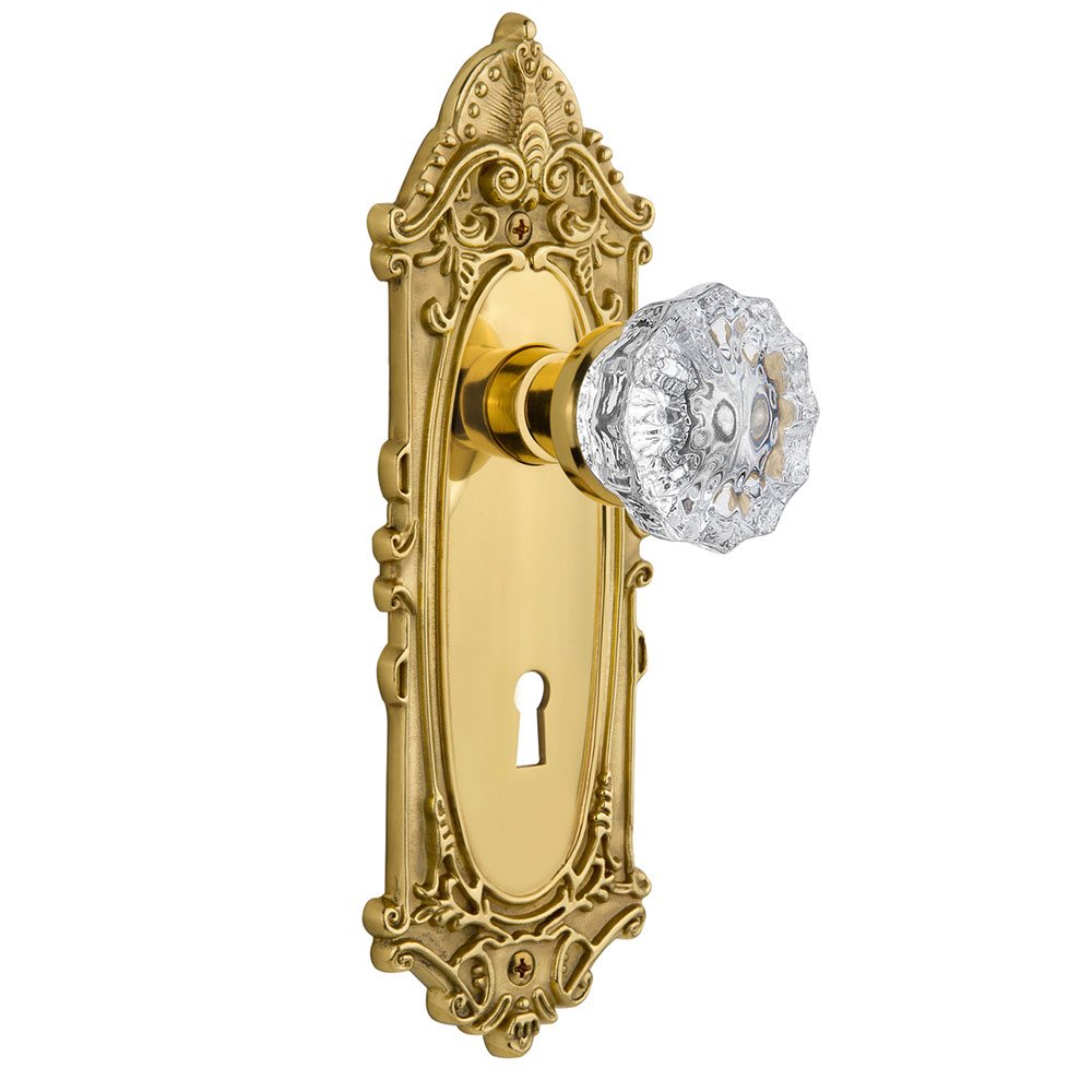 Nostalgic Warehouse Single Dummy Victorian Plate with Keyhole and Crystal Glass Door Knob in Polished Brass