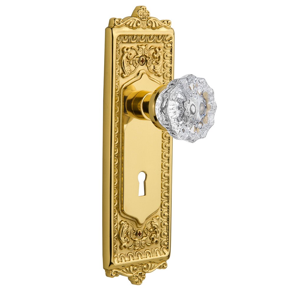 Nostalgic Warehouse Passage Egg & Dart Plate with Keyhole and Crystal Glass Door Knob in Polished Brass
