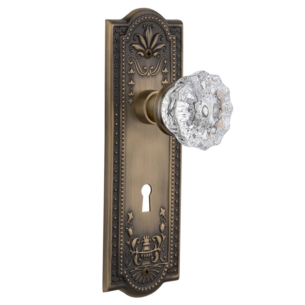 Nostalgic Warehouse Double Dummy Meadows Plate with Keyhole and Crystal Glass Door Knob in Antique Brass