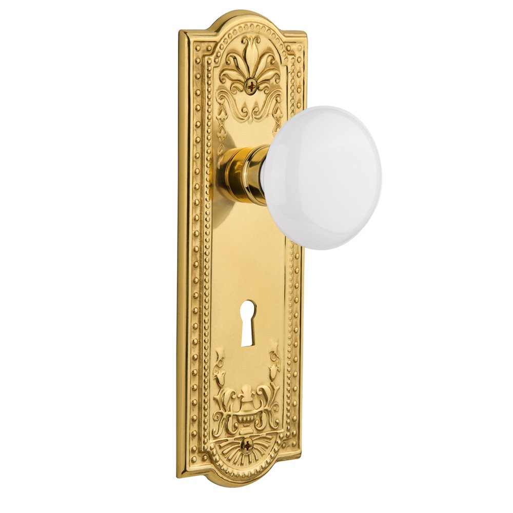 Nostalgic Warehouse Privacy Meadows Plate with Keyhole and White Porcelain Door Knob in Polished Brass