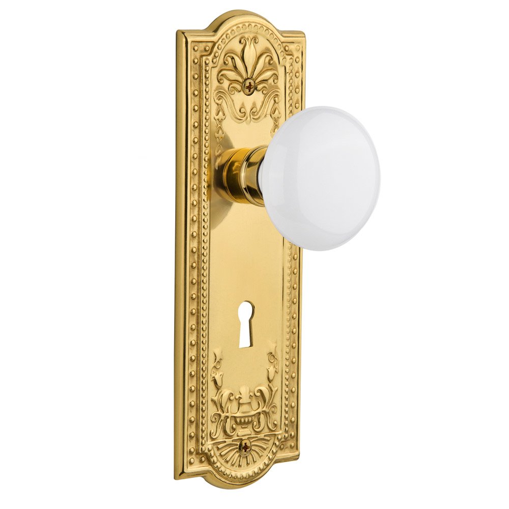 Nostalgic Warehouse Passage Meadows Plate with Keyhole and White Porcelain Door Knob in Polished Brass