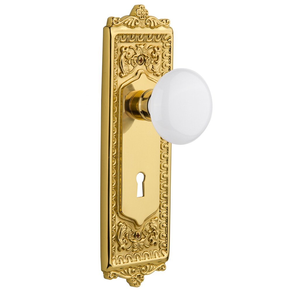 Nostalgic Warehouse Privacy Egg & Dart Plate with Keyhole and White Porcelain Door Knob in Polished Brass