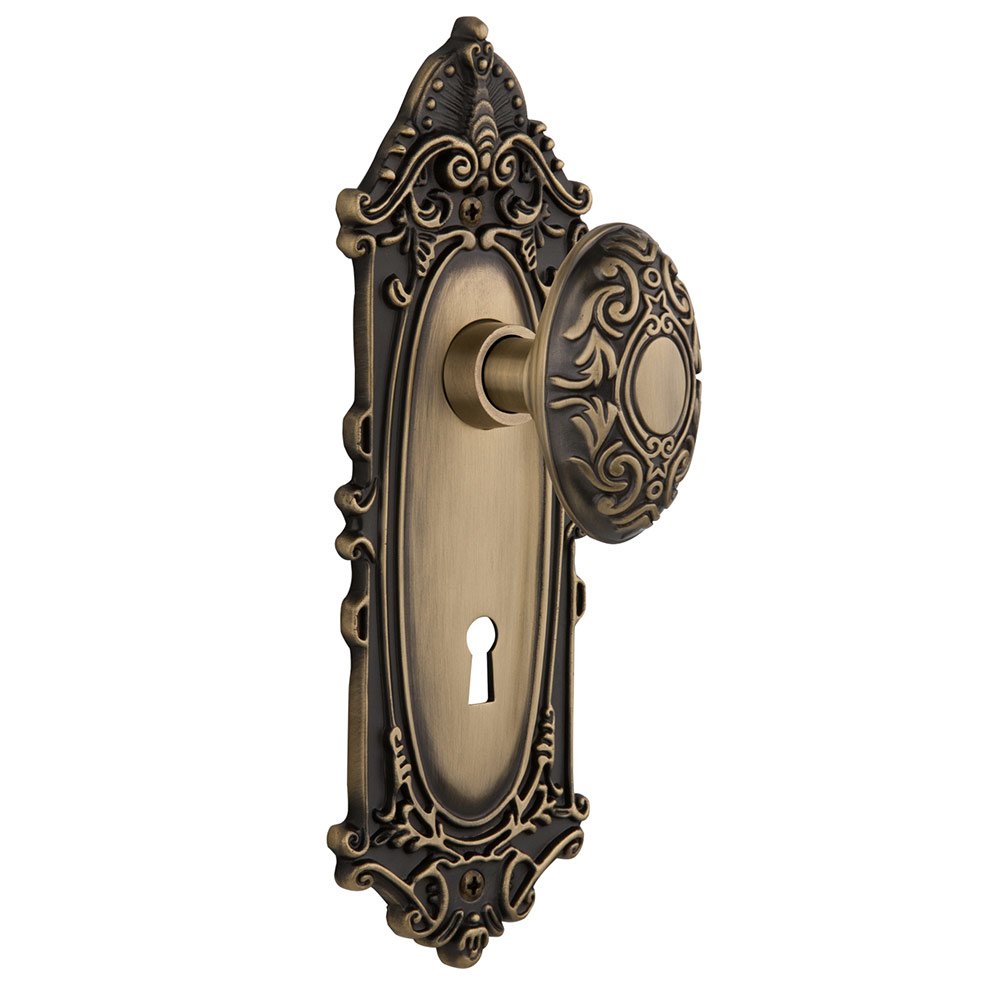 Nostalgic Warehouse Single Dummy Victorian Plate with Keyhole and Victorian Door Knob in Antique Brass