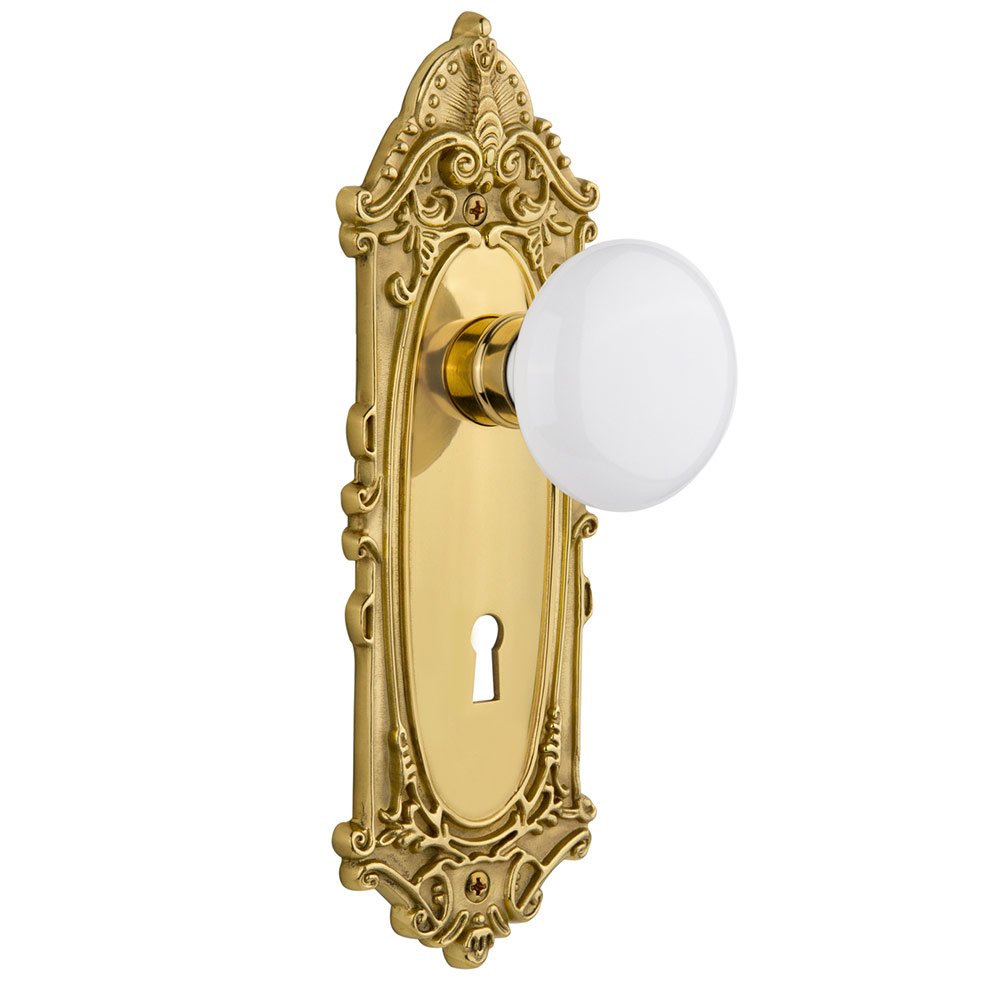 Nostalgic Warehouse Single Dummy Victorian Plate with Keyhole and White Porcelain Door Knob in Polished Brass