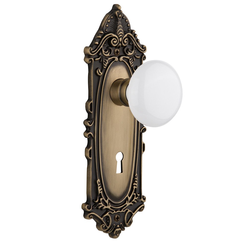 Nostalgic Warehouse Privacy Victorian Plate with Keyhole and White Porcelain Door Knob in Antique Brass