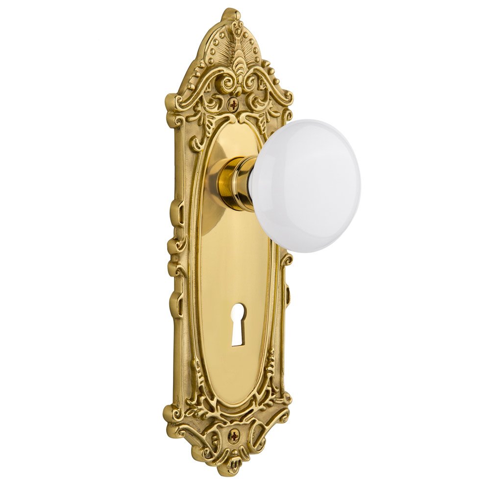 Nostalgic Warehouse Passage Victorian Plate with Keyhole and White Porcelain Door Knob in Polished Brass