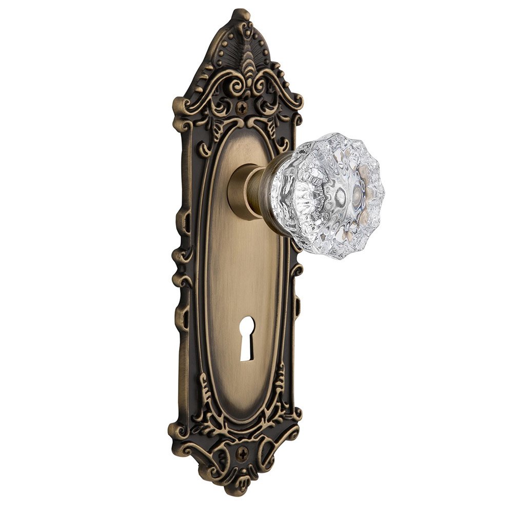 Nostalgic Warehouse Single Dummy Victorian Plate with Keyhole and Crystal Glass Door Knob in Antique Brass