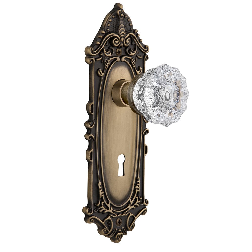 Nostalgic Warehouse Double Dummy Victorian Plate with Keyhole and Crystal Glass Door Knob in Antique Brass