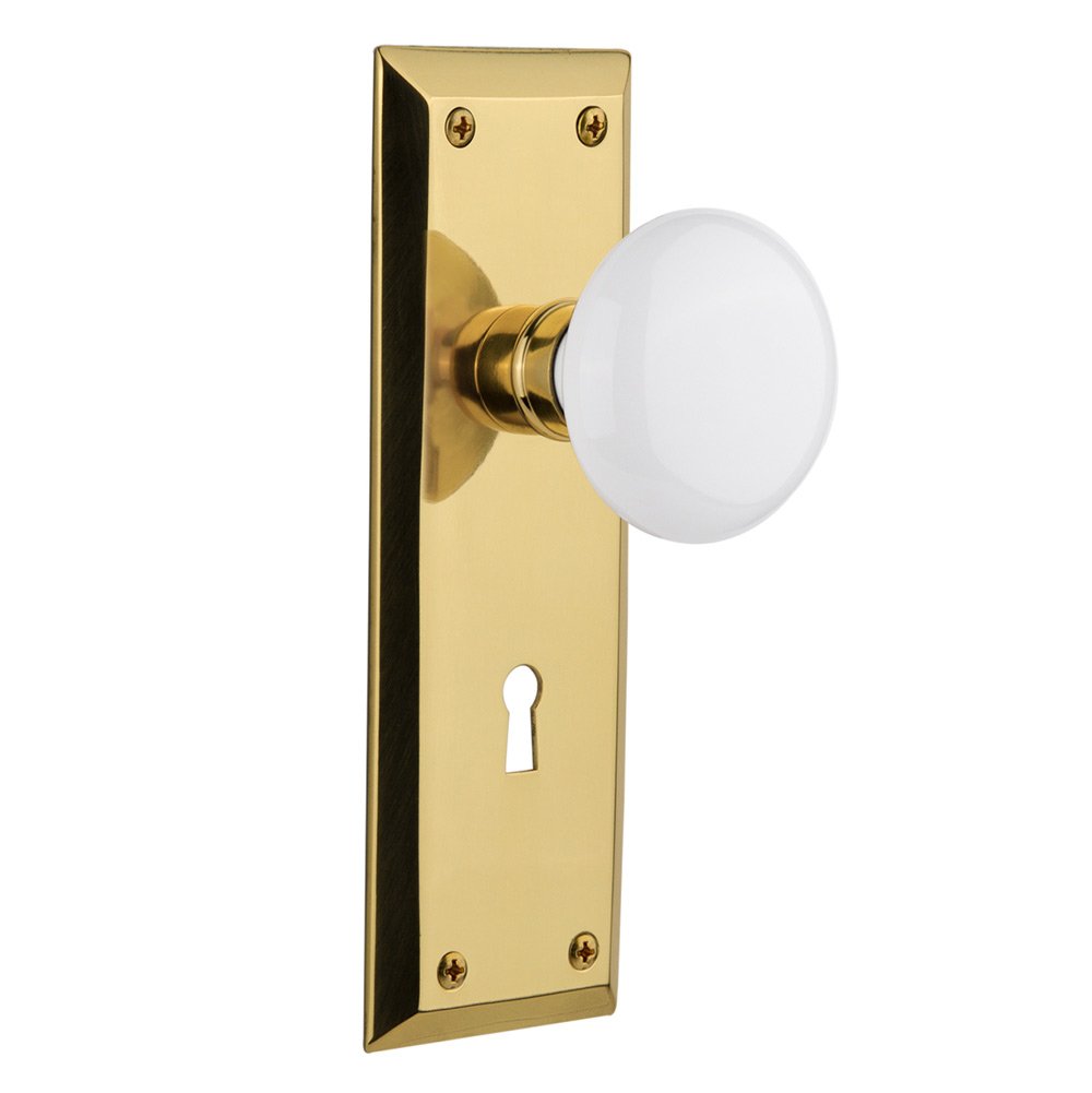 Nostalgic Warehouse Privacy New York Plate with Keyhole and White Porcelain Door Knob in Polished Brass