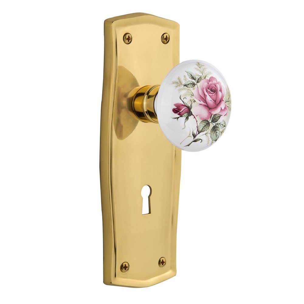 Nostalgic Warehouse Passage Prairie Plate with Keyhole and White Rose Porcelain Door Knob in Unlacquered Brass