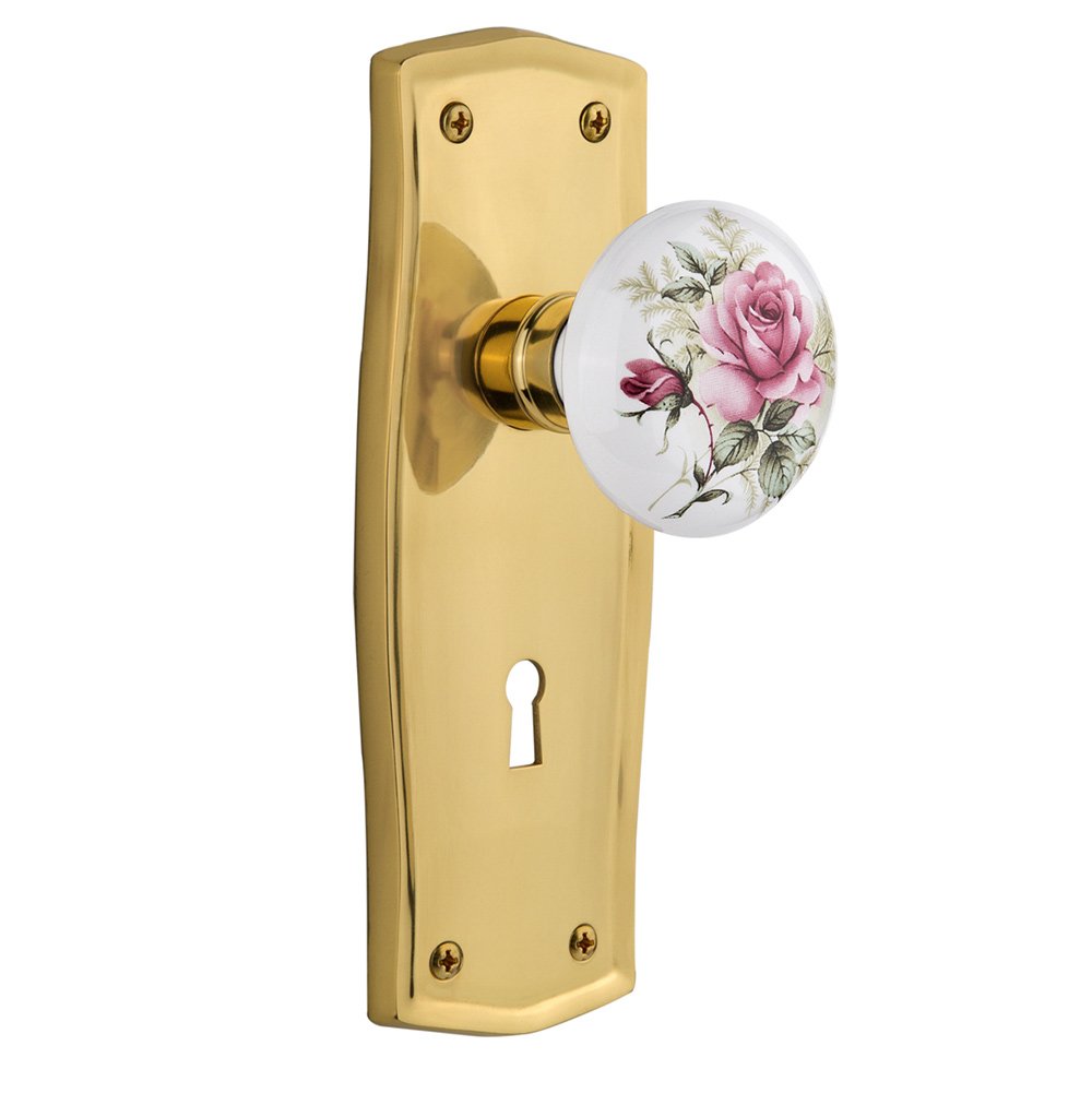 Nostalgic Warehouse Single Dummy Prairie Plate with Keyhole and White Rose Porcelain Door Knob in Unlacquered Brass
