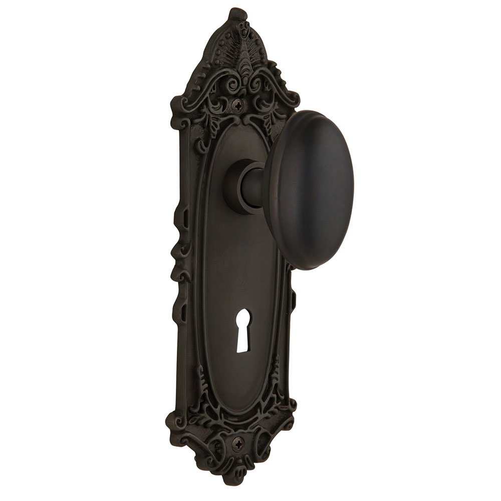 Nostalgic Warehouse Single Dummy Victorian Plate with Keyhole and Homestead Door Knob in Oil-Rubbed Bronze