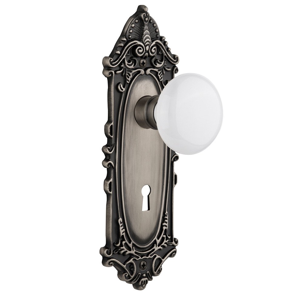 Nostalgic Warehouse Privacy Victorian Plate with Keyhole and White Porcelain Door Knob in Antique Pewter