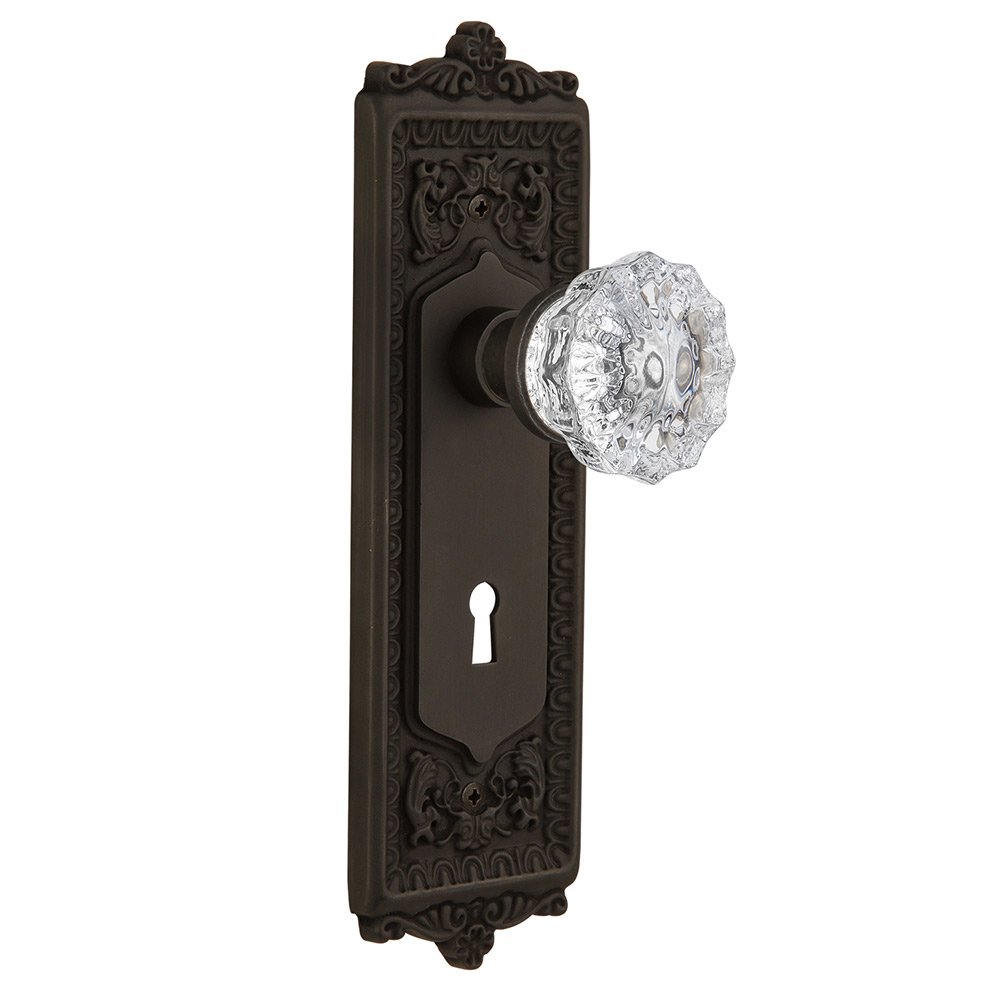 Nostalgic Warehouse Passage Egg & Dart Plate with Keyhole and Crystal Glass Door Knob in Oil-Rubbed Bronze