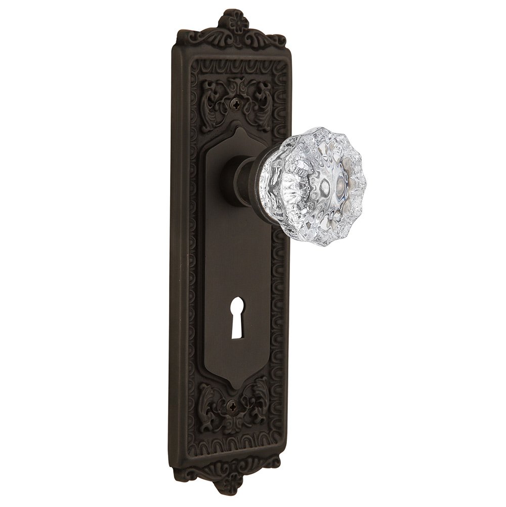 Nostalgic Warehouse Double Dummy Egg & Dart Plate with Keyhole and Crystal Glass Door Knob in Oil-Rubbed Bronze