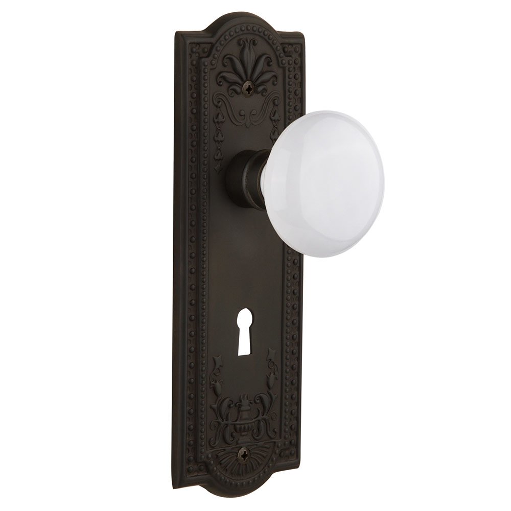 Nostalgic Warehouse Double Dummy Meadows Plate with Keyhole and White Porcelain Door Knob in Oil-Rubbed Bronze