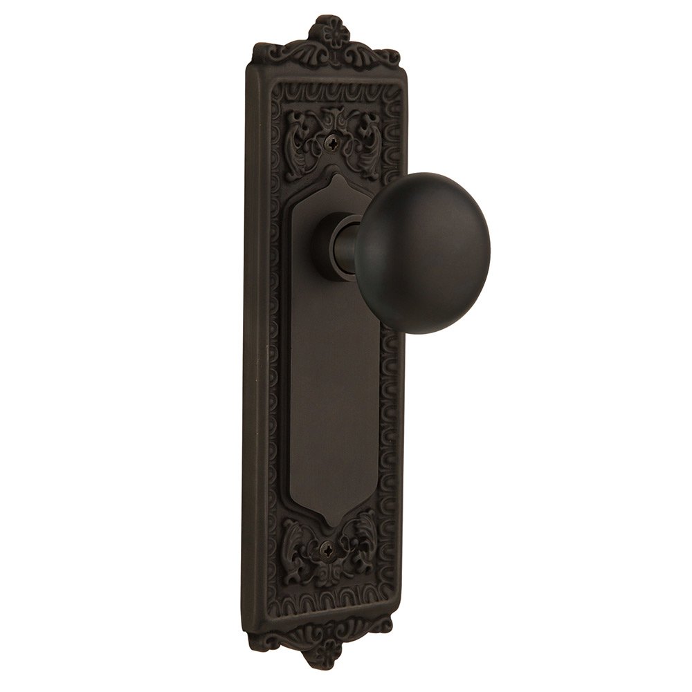 Nostalgic Warehouse Passage Egg & Dart Plate with New York Door Knob in Oil-Rubbed Bronze