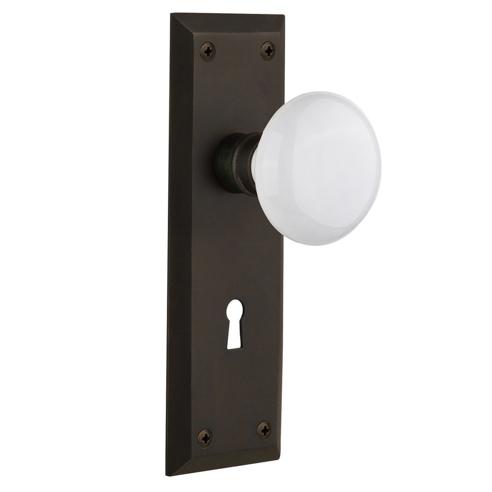 Nostalgic Warehouse Double Dummy New York Plate with Keyhole and White Porcelain Door Knob in Oil-Rubbed Bronze